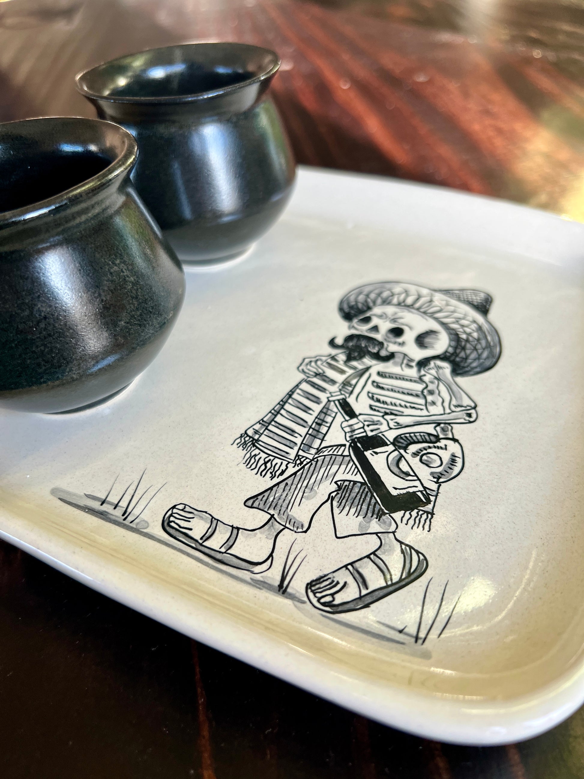 Handmade Skeleton Ceramic Tray with Black Shot Glasses – Mexican Artisan Barware