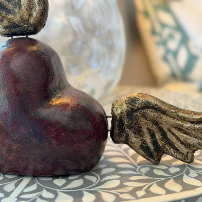 Decorative red winged heart artisan sculpture