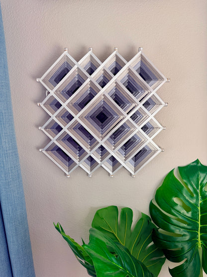 Handmade Process Mandala by Oaxacan artisan Cuicari Mandalarte in white and gray sacred geometry thread design.